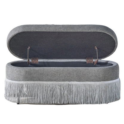 Oval Upholstered Storage Ottoman With Fringe Trim &amp; Lift Top Lid